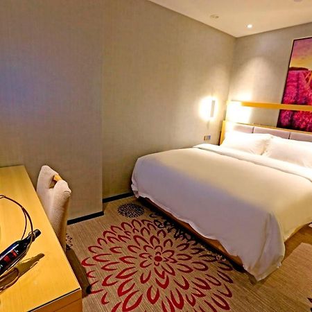 Lavande Hotel Taixing Jiangping Road Bagian luar foto